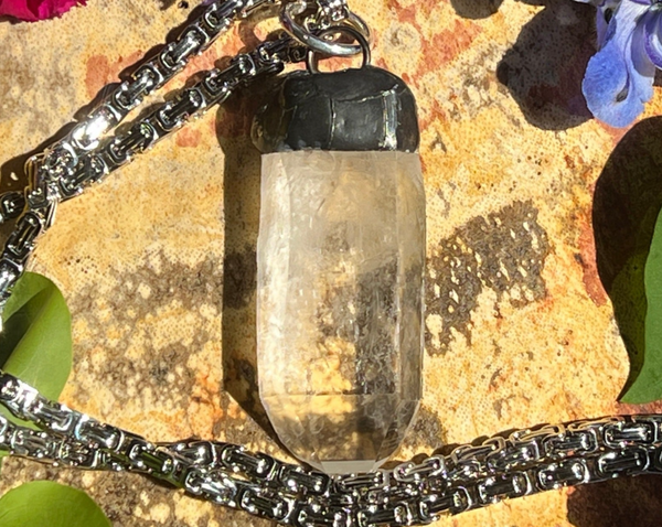 Quartz Point with Thumb indent Soldered and Hanging on Stainless Steel Chain