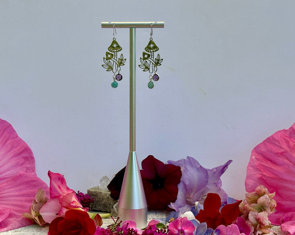 mushroom earrings on stand