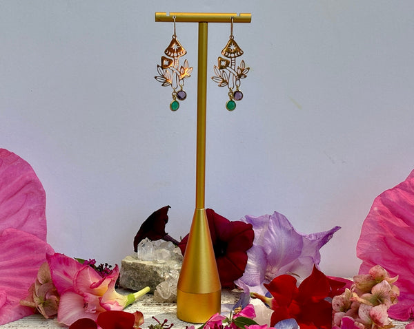 mushroom earrings on stand