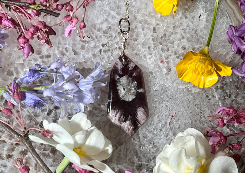 Drilled Atomic Amethyst hanging from Sterling Silver Chain