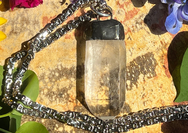 Quartz Point with Thumb indent Soldered and Hanging on Stainless Steel Chain