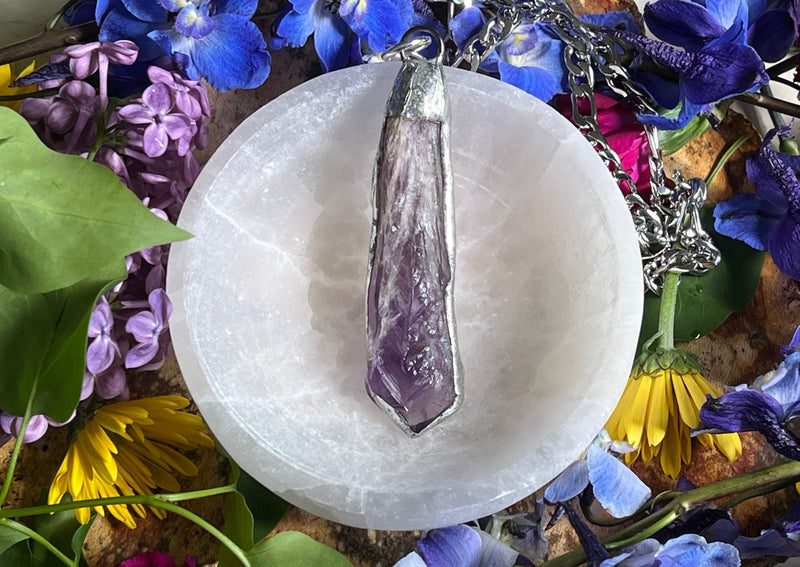 chevron amethyst fan sitting in selentie bowl