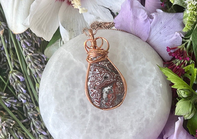 Crazy Lace Agate Wrapped in Copper Hanging on Rose Gold Chain