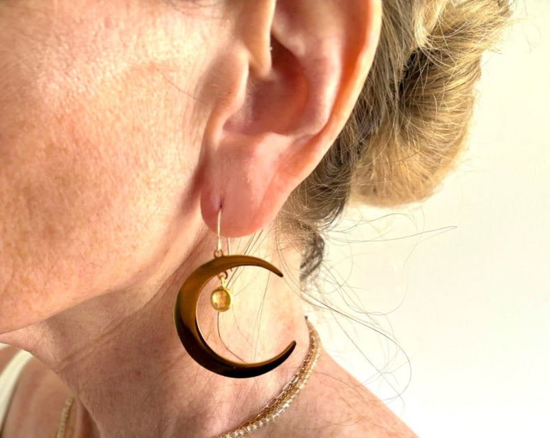 moon earring on model