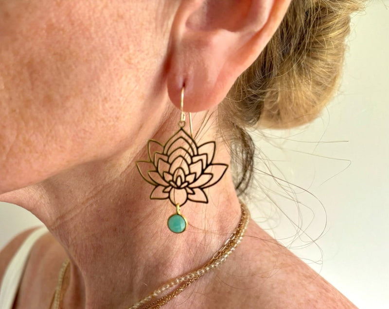 lotus earrings on model