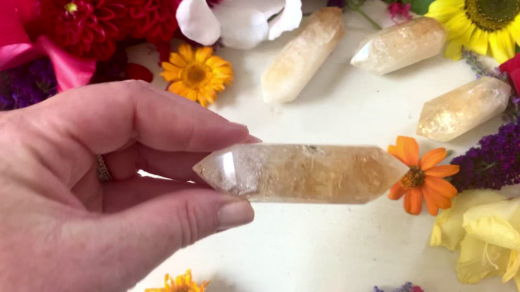 video showing one yellow citrine double terminated point. 