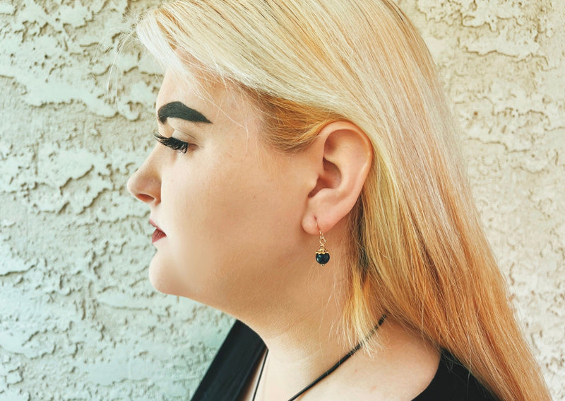 large lapis drop earrings on model