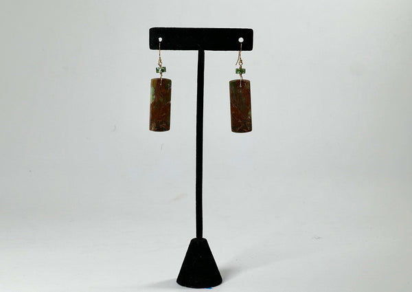 african green opal earrings with jasper detail on black t stand. 