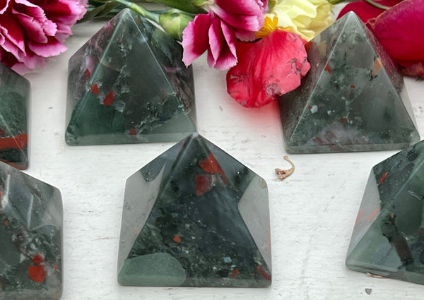 bloodstone pyramids on table. 