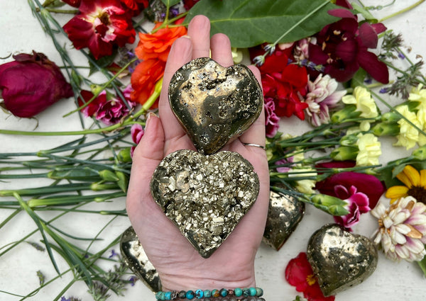 pyrite hearts in hand. 