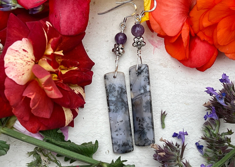Sage Chalcedony earrings on a table with flowers. 
