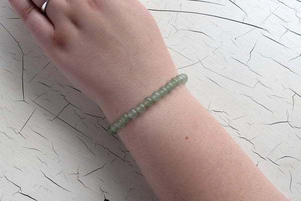 green aventurine energy bracelet on models arm 