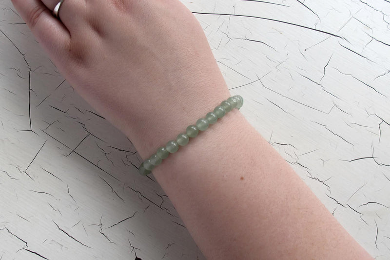 green aventurine energy bracelet on models arm 